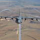 An EC-130H deploys IR flares during a training mission over southern Arizona. Photo credit Gary Wetzel